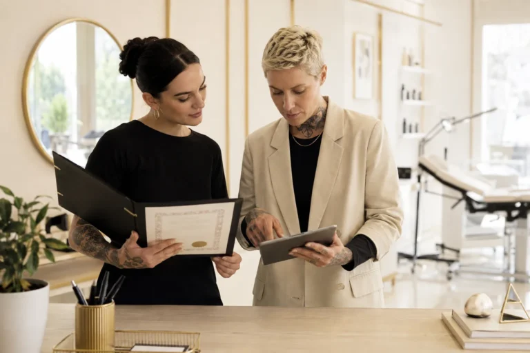 Body art professionals comparing a generic certificate with an online verification record without exposing personal information